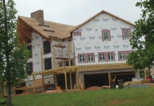 Note chimney of stacked stone.  Stone will be carried down that entire wall.